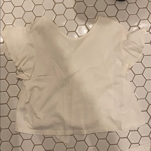 white ruffle sleeve top